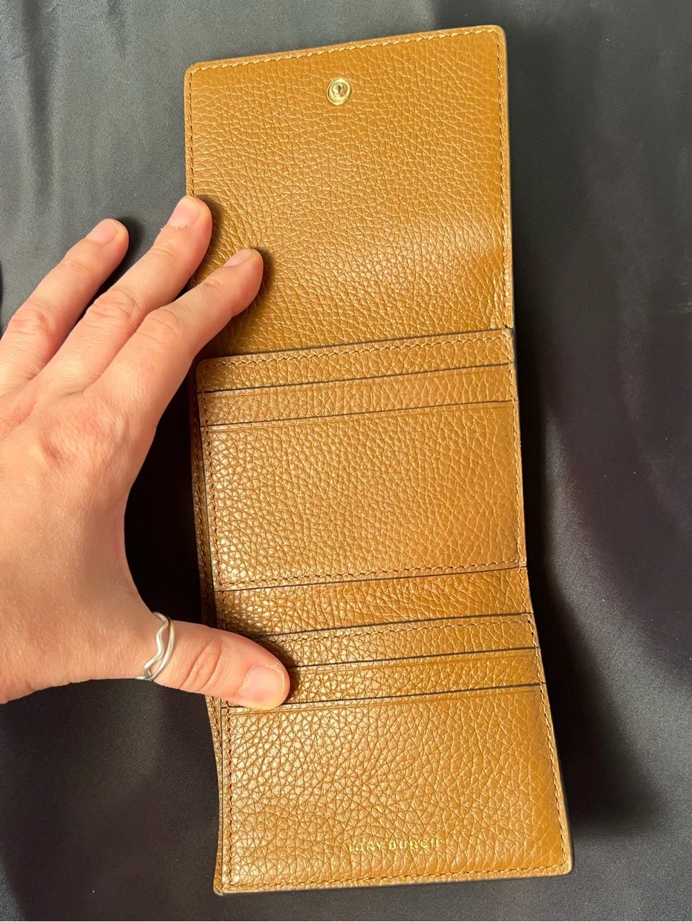Tory Burch Britten Brown Moose Pebbled Leather Tri-Fold Wallet 4” L x 3.75” W